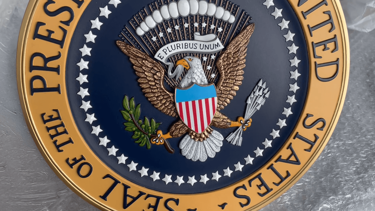 Presidential Seal Controversy Hits TRUMP Memecoin Holder Event